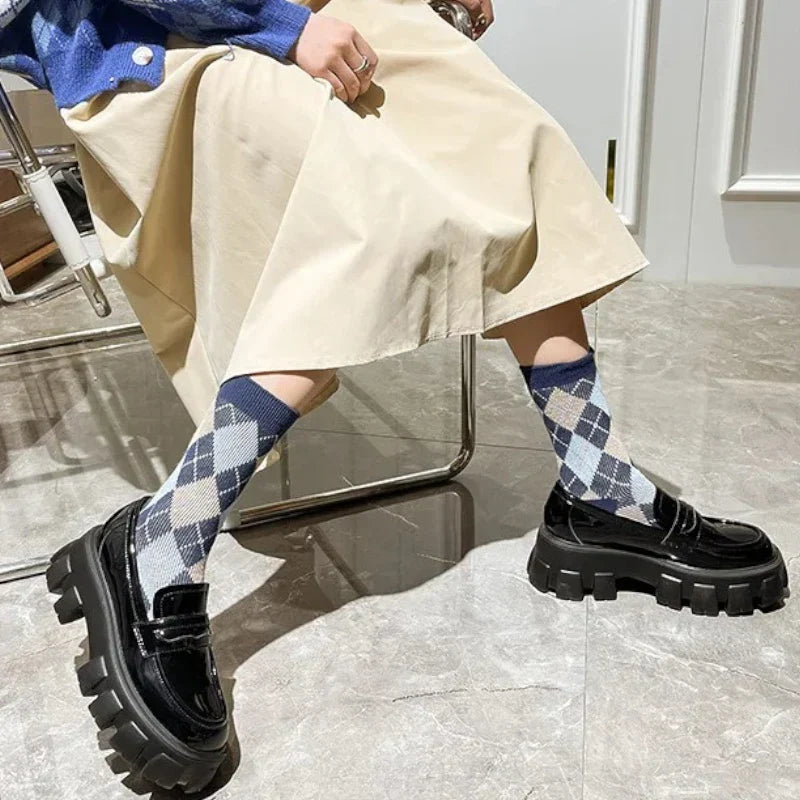 schwarzer orthopädischer Damenmokassin mit Keilsohle