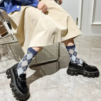 schwarzer orthopädischer Damenmokassin mit Keilsohle