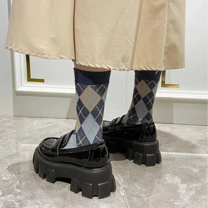 schwarzer orthopädischer Damenmokassin mit Keilsohle